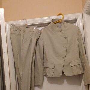 New York & Company Tan Pantsuit pants ard a size 12.Jacket is a 14 free shipping